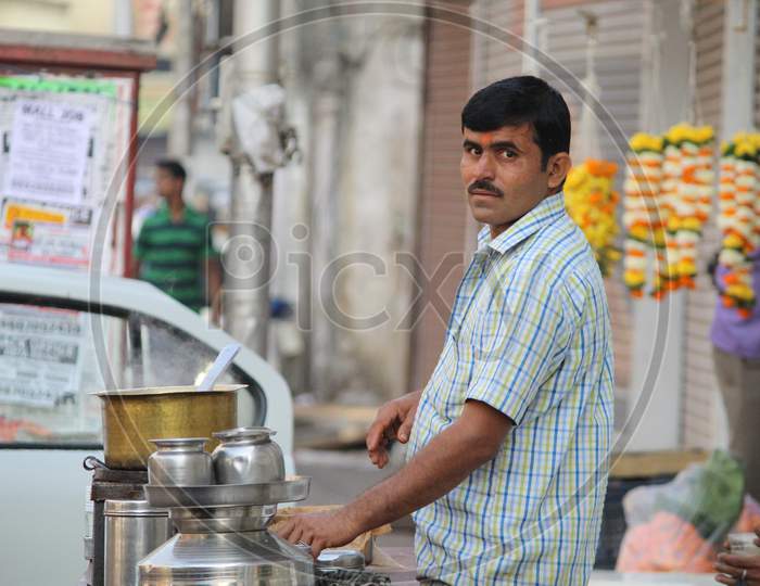 A Tea Vendor At a Stall