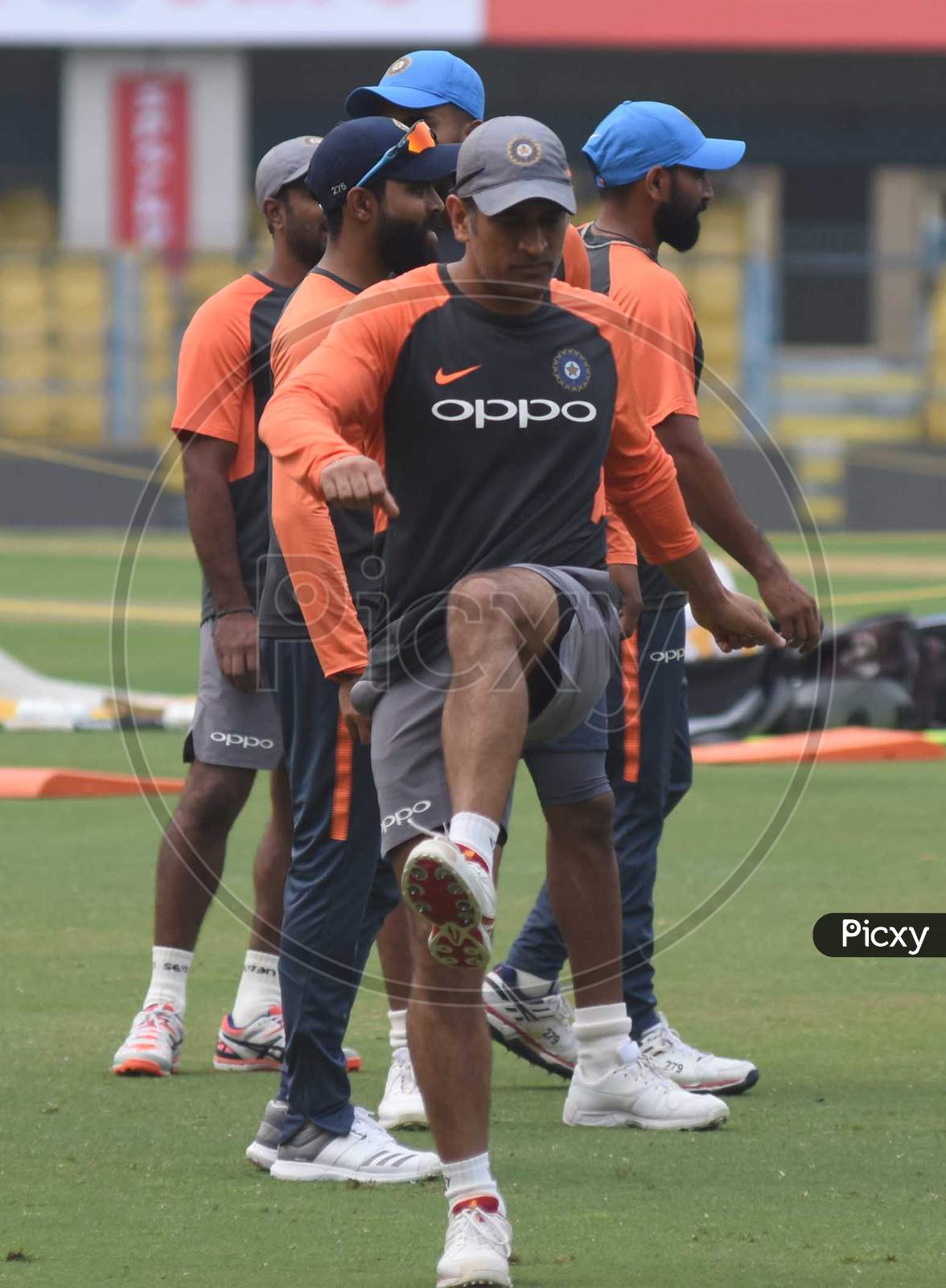 Team India Player  M.S Dhoni Plays During A Practice Session Ahead Of The First One Day International Cricket Match Against West Indies, At Aca Cricket Stadium, Barsapara In Guwahati