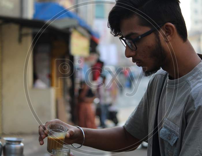 A Man Sharing Tea