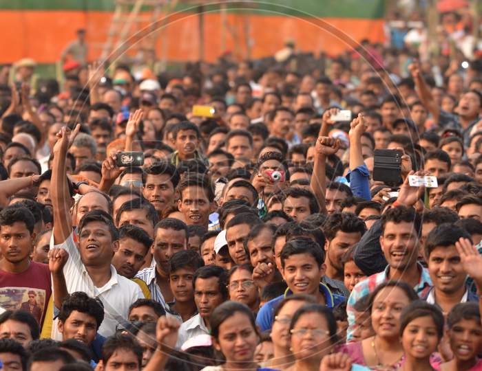 Image Of Crowd Of Young Indian Cheering And Recording With Smartphones