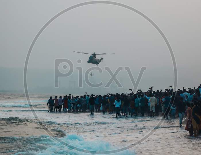 Visitors Watching The Naval Day Celebrations in Vizag Beach