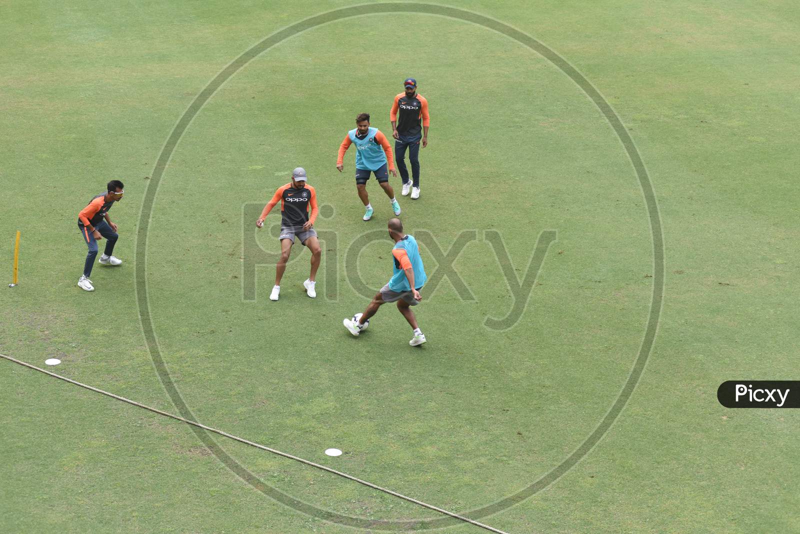 image-of-indian-cricket-team-playing-football-in-practice-session-at