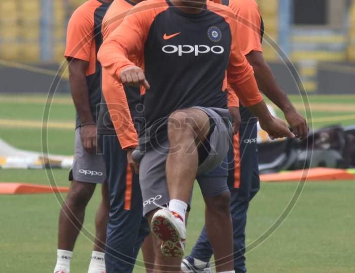 Team India Player  M.S Dhoni Plays During A Practice Session Ahead Of The First One Day International Cricket Match Against West Indies, At Aca Cricket Stadium, Barsapara In Guwahati