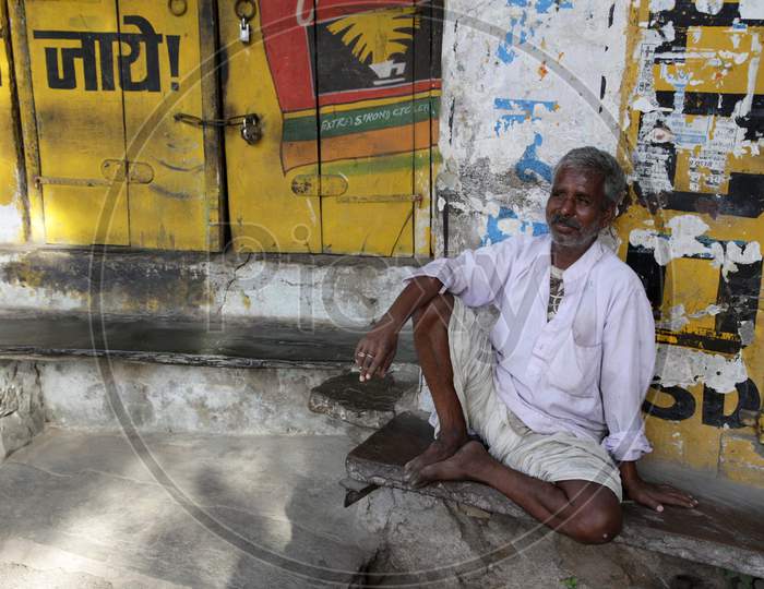 Rajasthani Old Man Sat outside a Shop