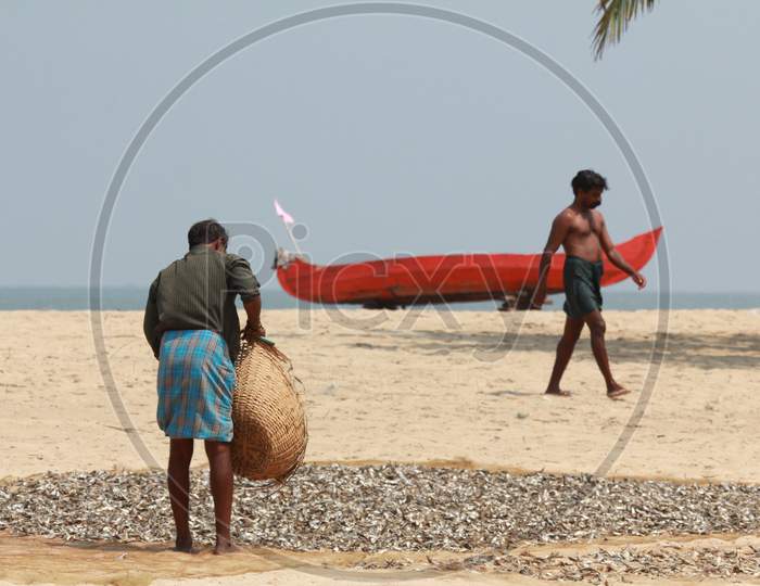 Fishermen in Marari Beach, Kerala