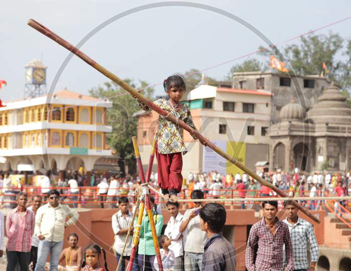 Small Girl walking on Rope in Kumbh Mela, Ujjain, Madhya Pradesh