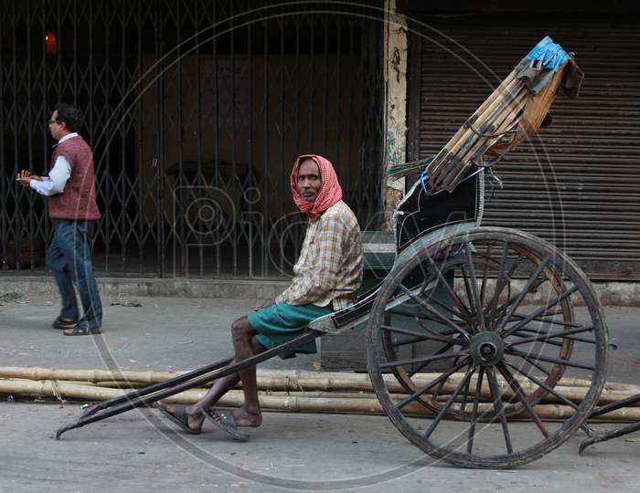 Indian Old Man in a Rickshaw, Kolkata