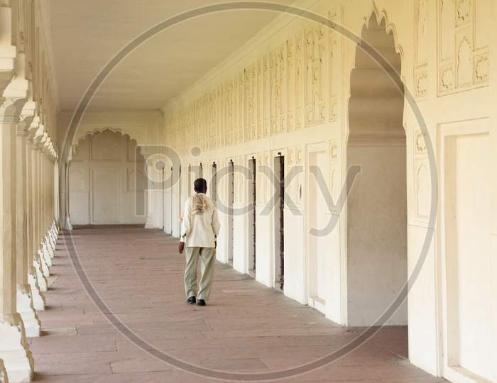 Old Man walking inside Taj Mahal, Agra