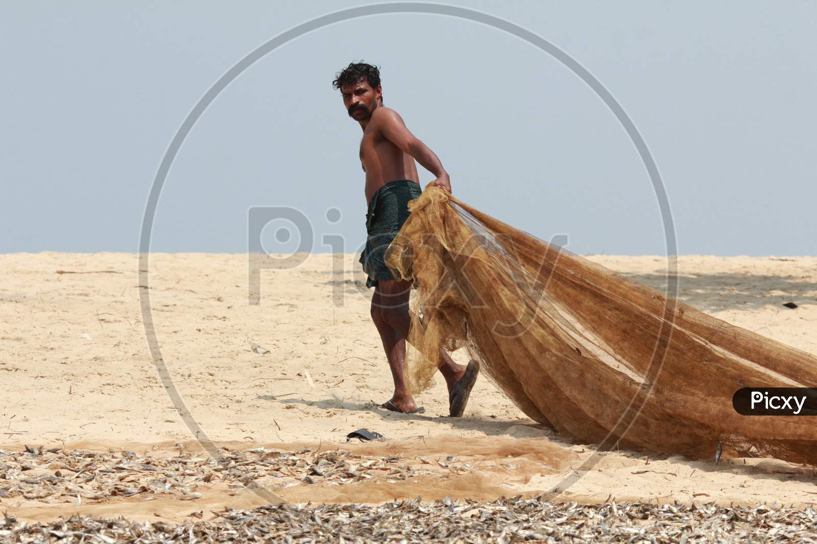 Fishermen in Marari Beach, Kerala