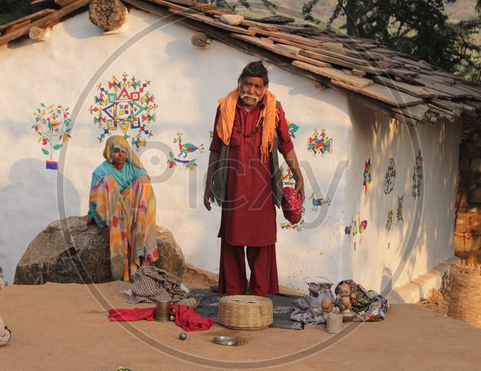 Rajasthani Old Man outside a House