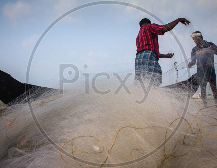 Fishermen Catching Fishes, Marari Beach, Kerala