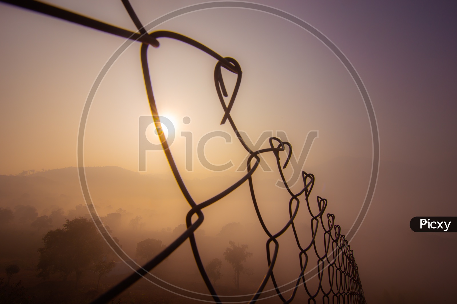 Silhouette Of Fence  Over Sunset Sky