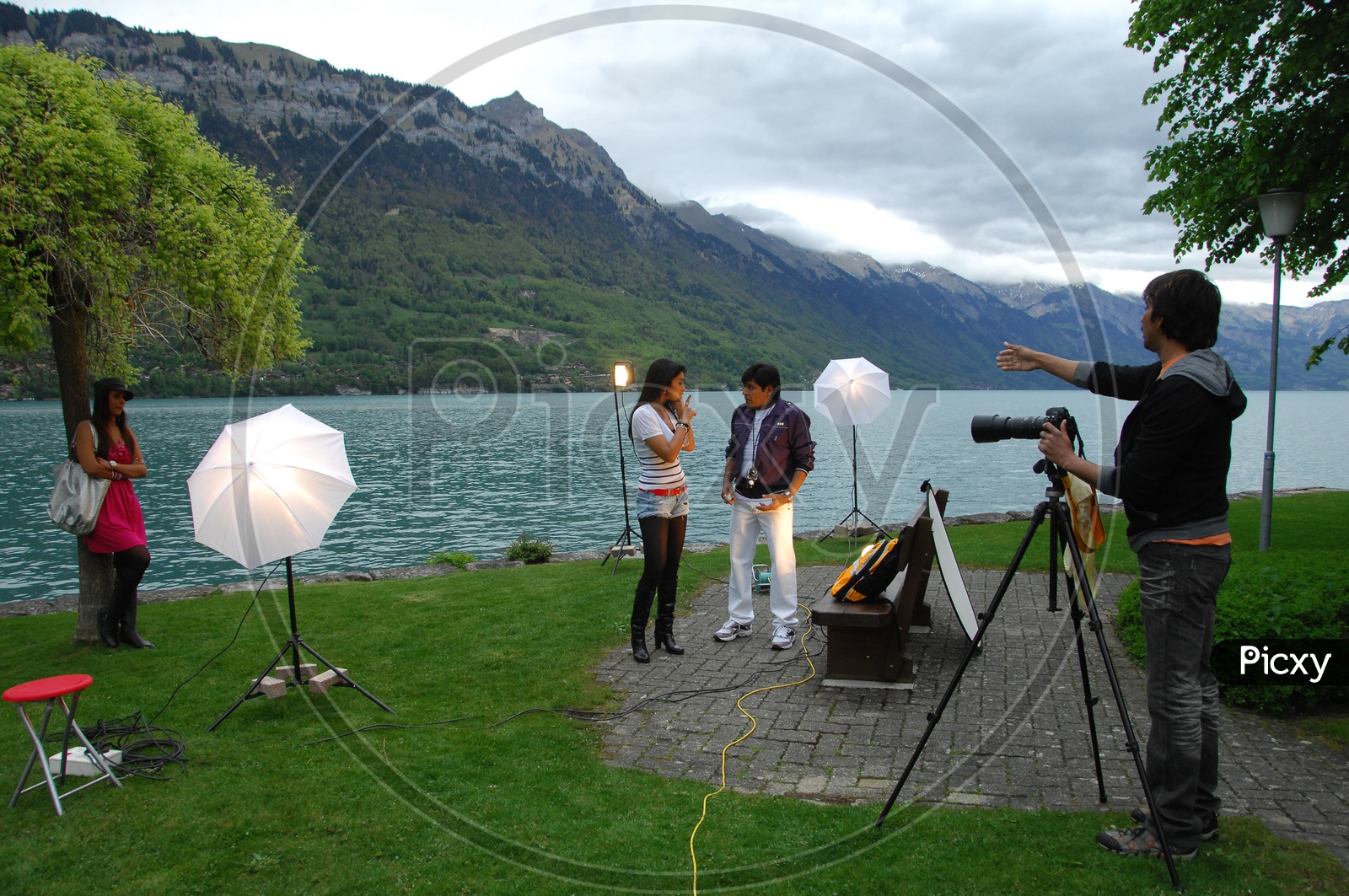 Photo Shoot In Swiss Alps With Mountains in Background In Movie Working Stills