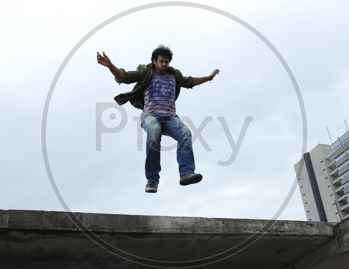 Man Jumping From a Building In A Movie Working Stills