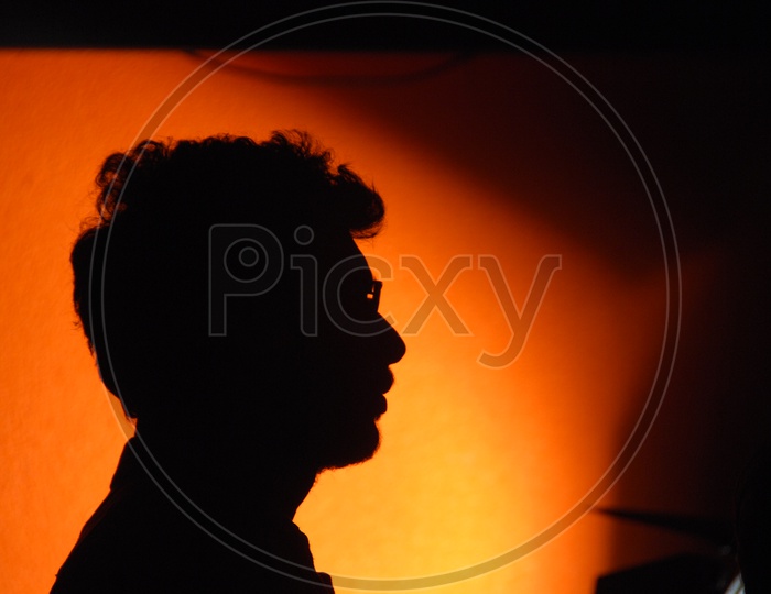 Silhouette of a Man Wearing Spectacles