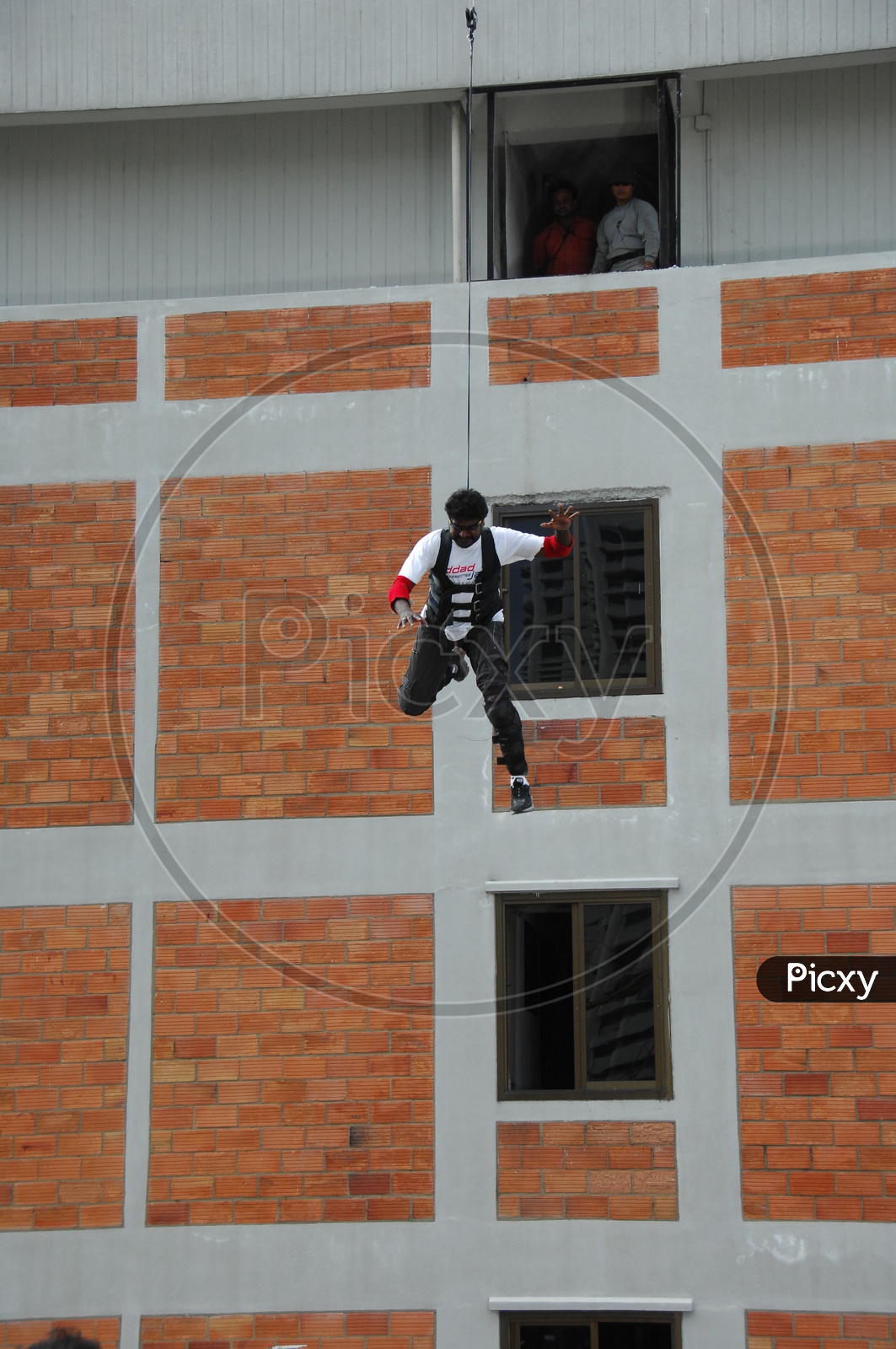 Man Jumping From a Building In Movie Working Stills