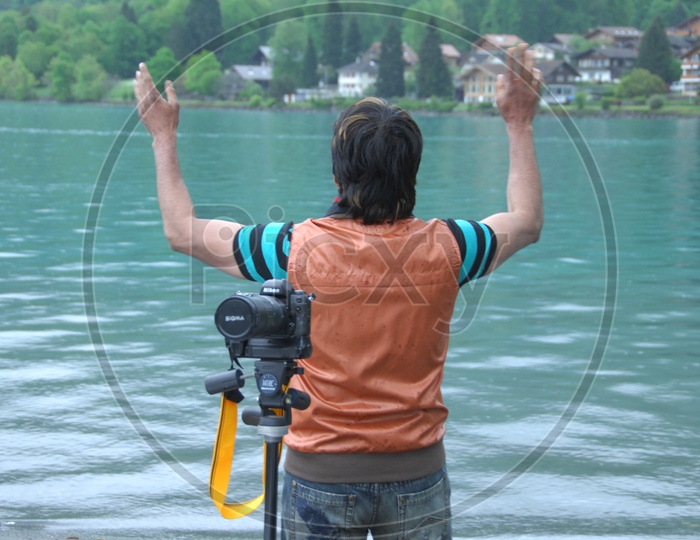 A Photographer At a River Front