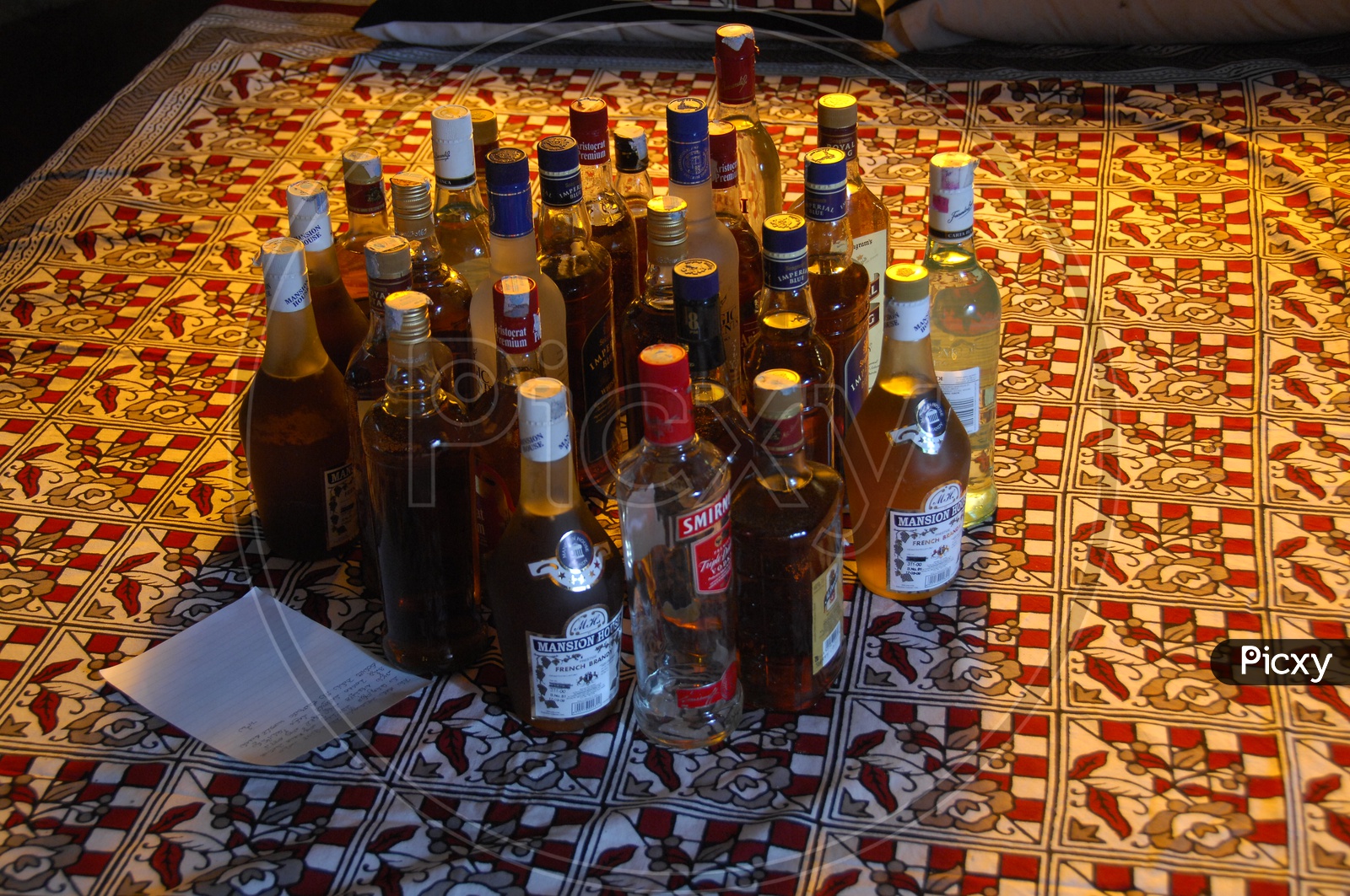 Alcohol Bottles on a Bar Counter Table