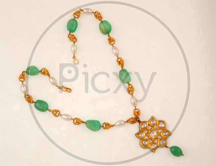 Necklace Jewelery With Gemstones On An Isolated White Background