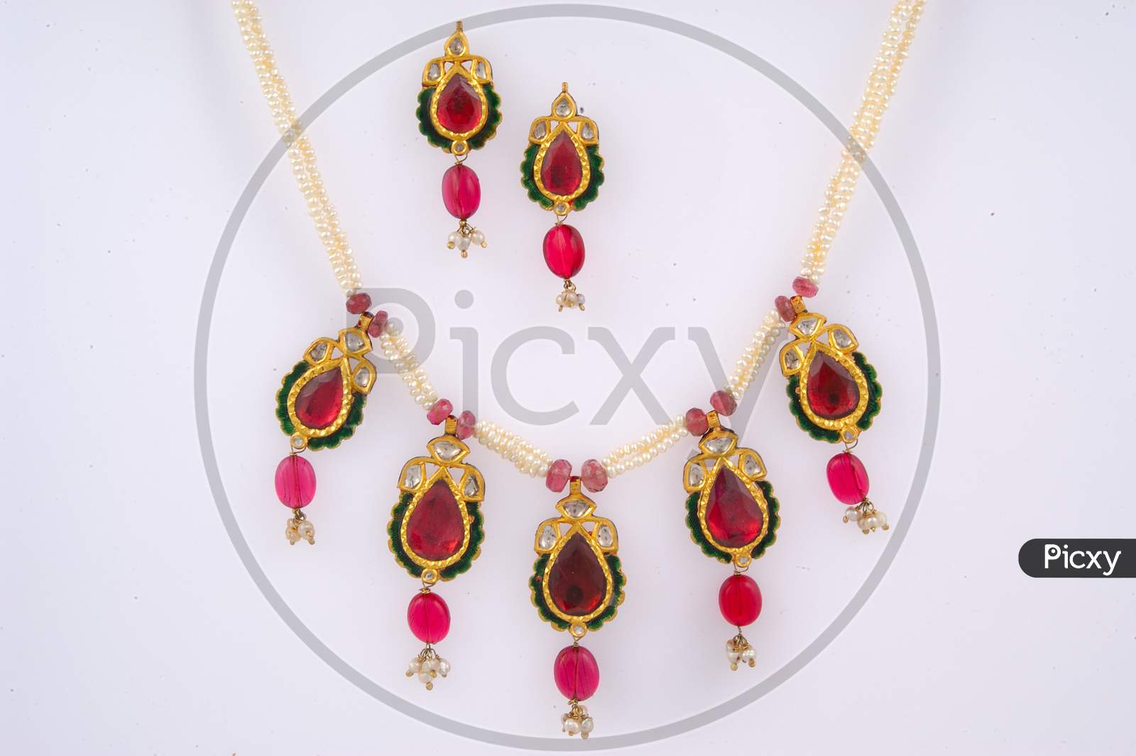 Diamond Necklace And Ear Rings  With Gemstones On a Isolated White Background