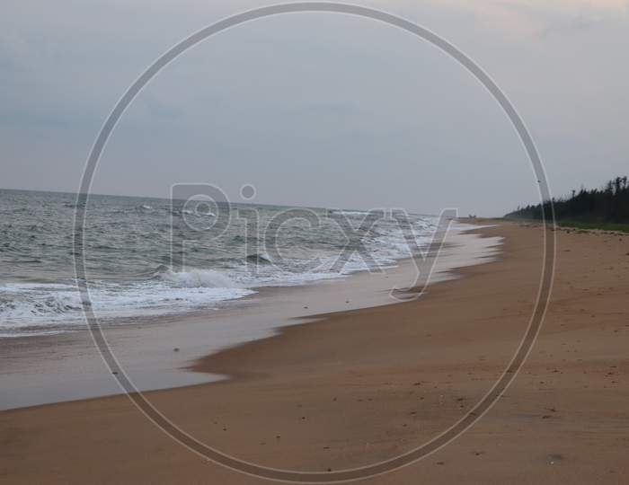 Beautiful Nature Sea Summer Background.Sand Beach And Wave Of The Sea.