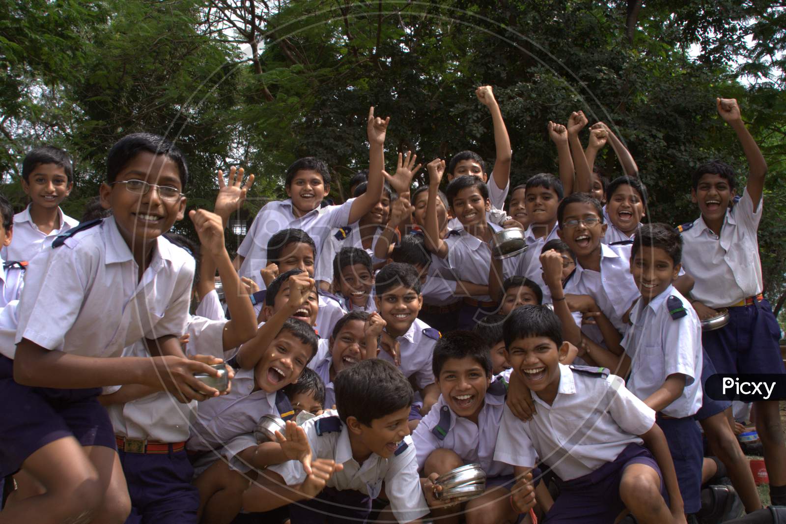 Group Of School Children With Smile Face And With Thumb Up Gesture