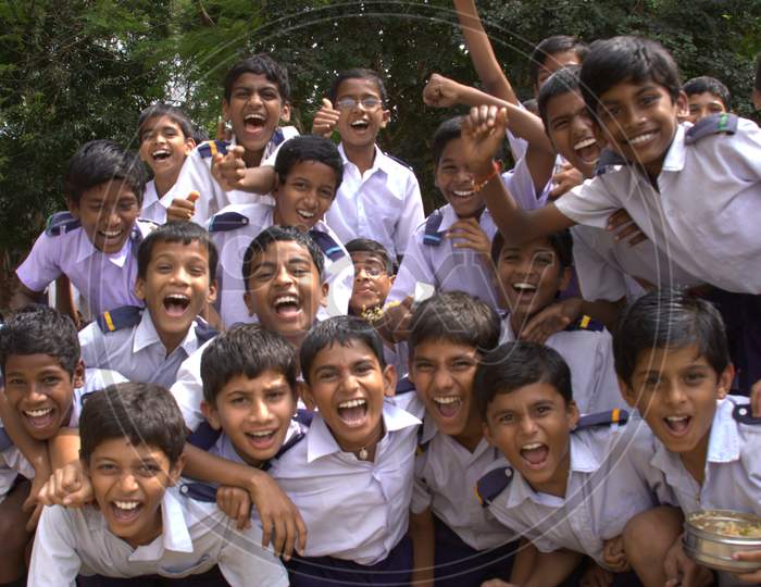 Group Of School Children With Smile Face And With Thumb Up Gesture
