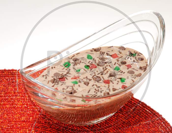 Indian Sweet Savory Kheer With Chocolate Ship Topping Served in a Bowl