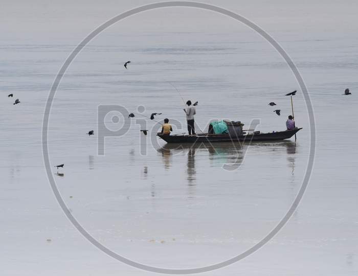 Fisherman on river brahmaputra