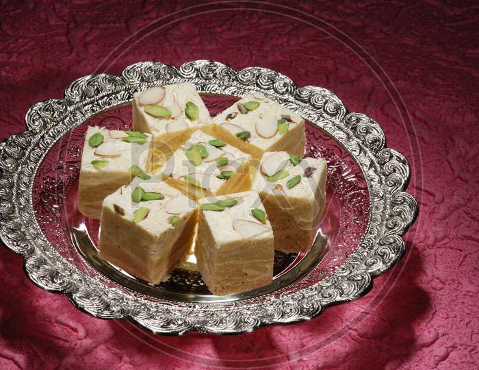 Indian Sweet Savory , Soan Papdi Served in a Plate