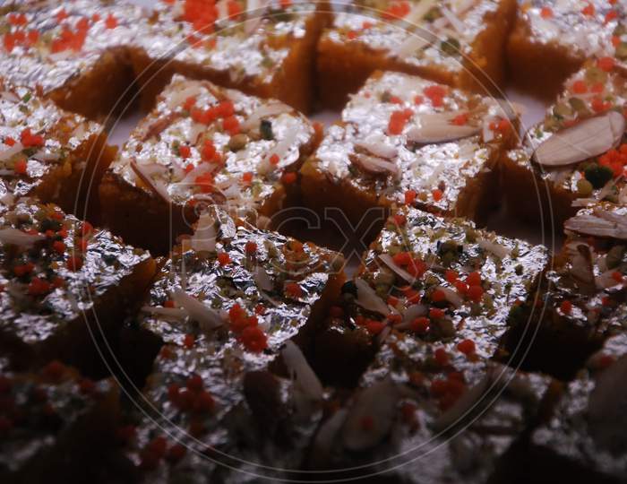 Indian Sweets Savories or Desserts Closeup Forming a Background