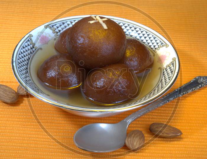 Gulab Jamun , Indian Sweet Savory Or Dessert Served in a Bowl