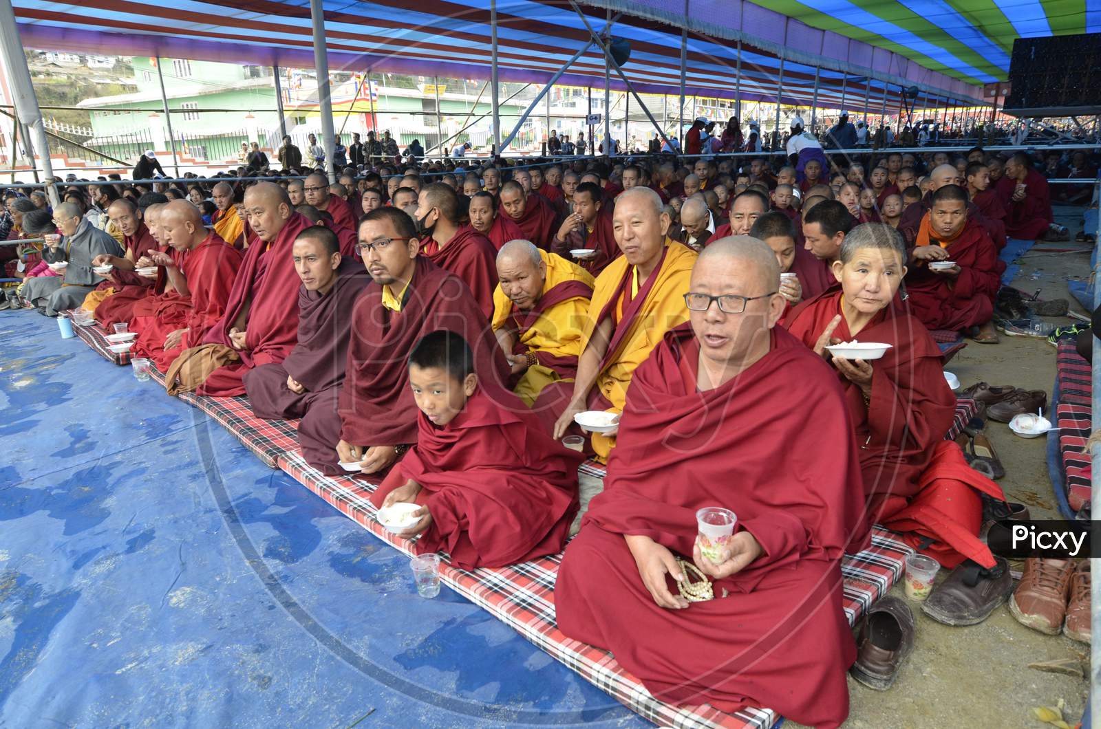 Monks wait for the arrival of Tibetan spiritual leader Dalai Lama at the Tawang Monastery