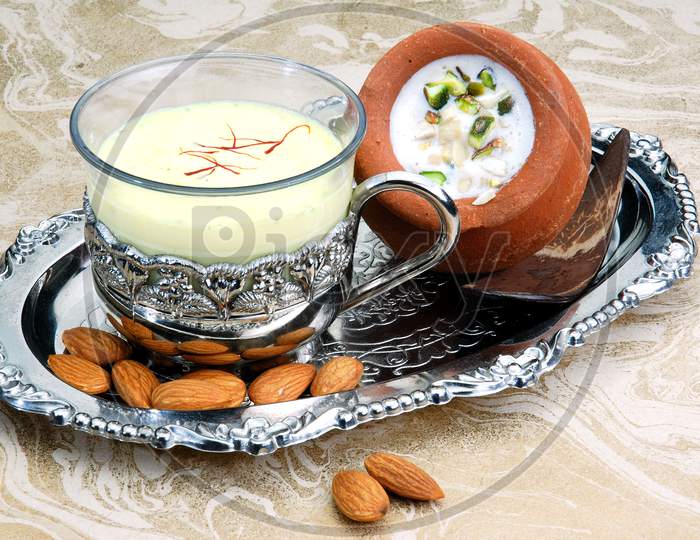 Indian Sweet Dessert or Sweet Condensed Milk With Saffron And Nuts