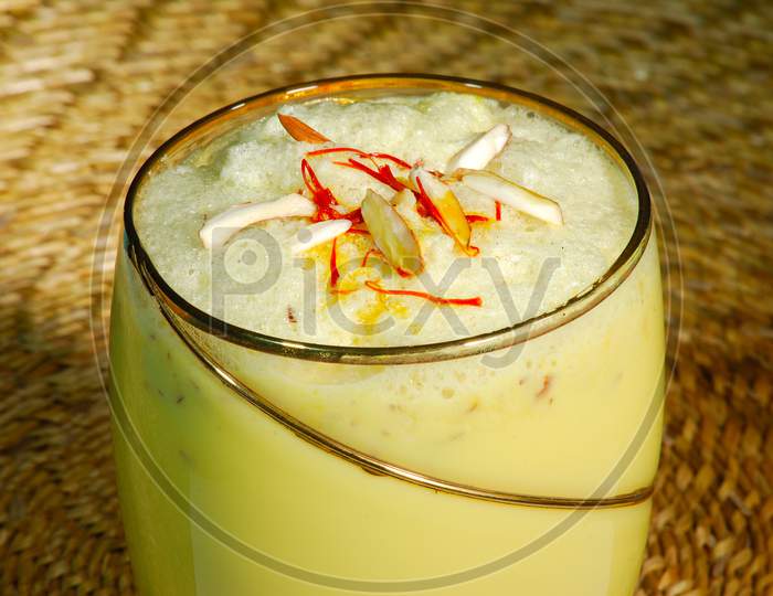 Indian Dessert Condensed Milk With Saffron And Nuts Topping