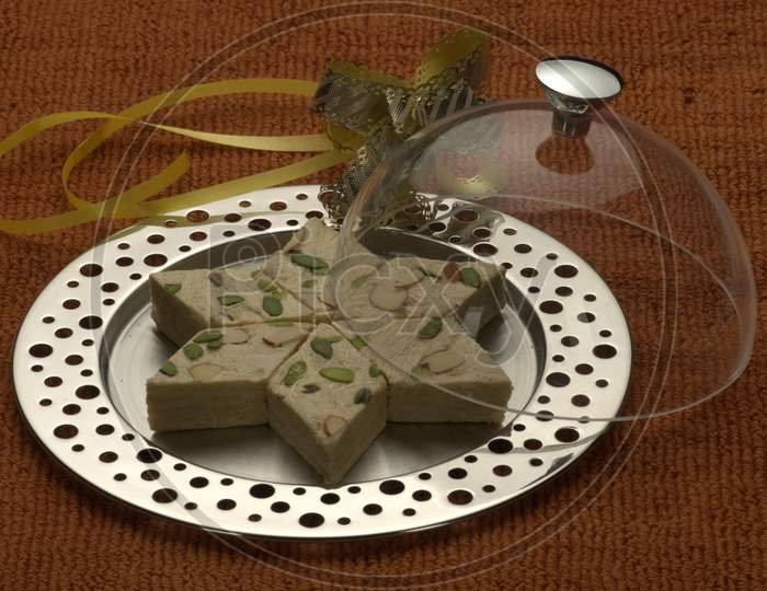Indian Sweet Soan Papdi Served in a Plate