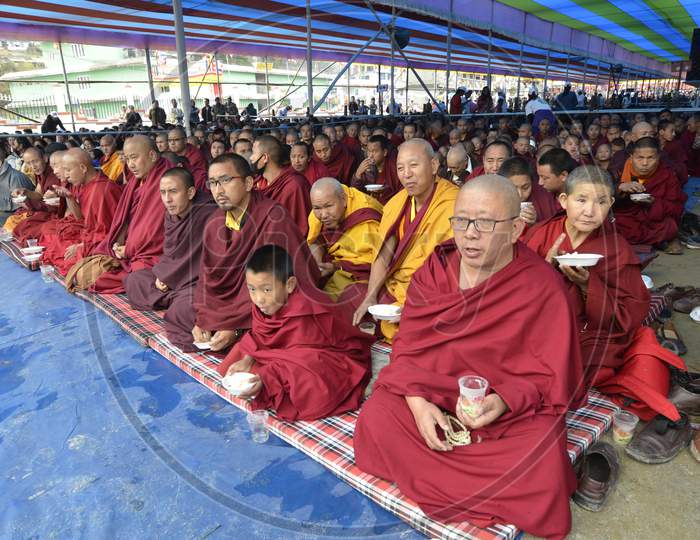 Monks wait for the arrival of Tibetan spiritual leader Dalai Lama at the Tawang Monastery