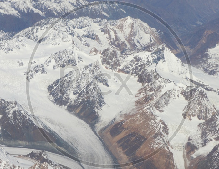 Beautiful Landscape of Snow Capped Mountains of Leh from flight window