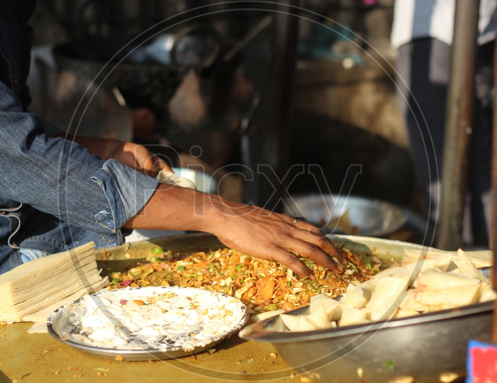 Indian Street food Vendor Preparing Samosas