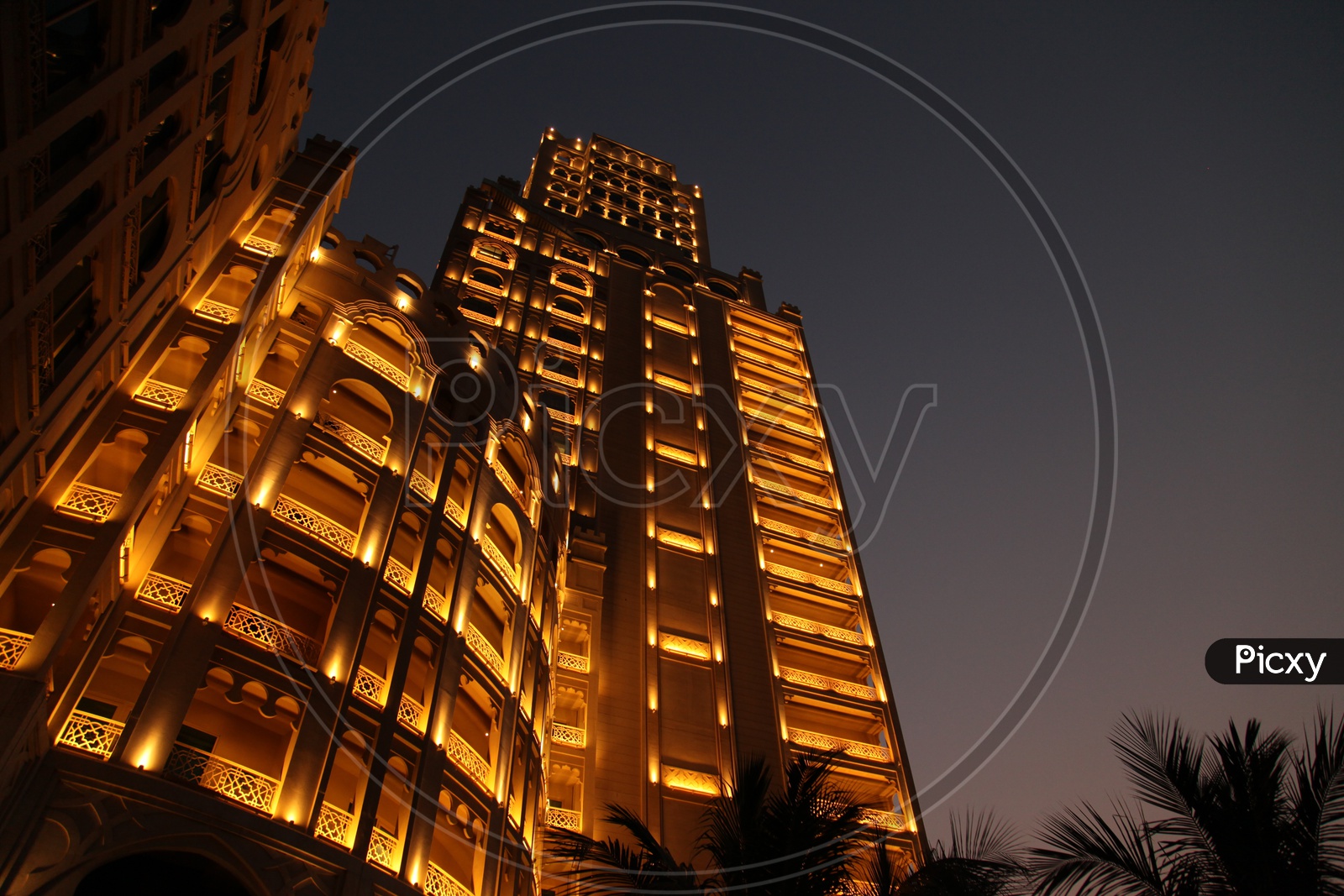 High Rise Building in Night with Luminous Lights