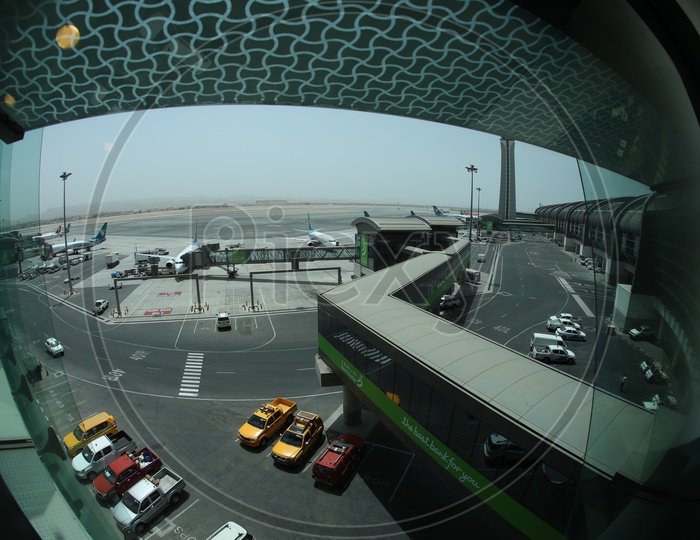 Airport Views With planes and Vehicles parked