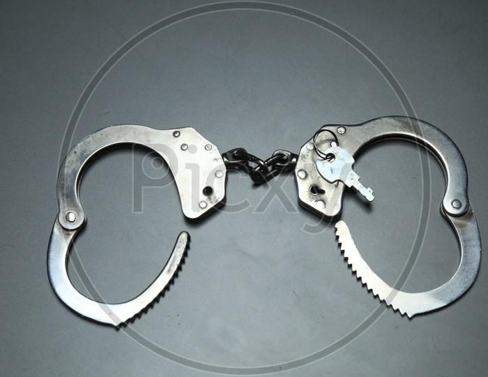 Hand Cuffs on a Table
