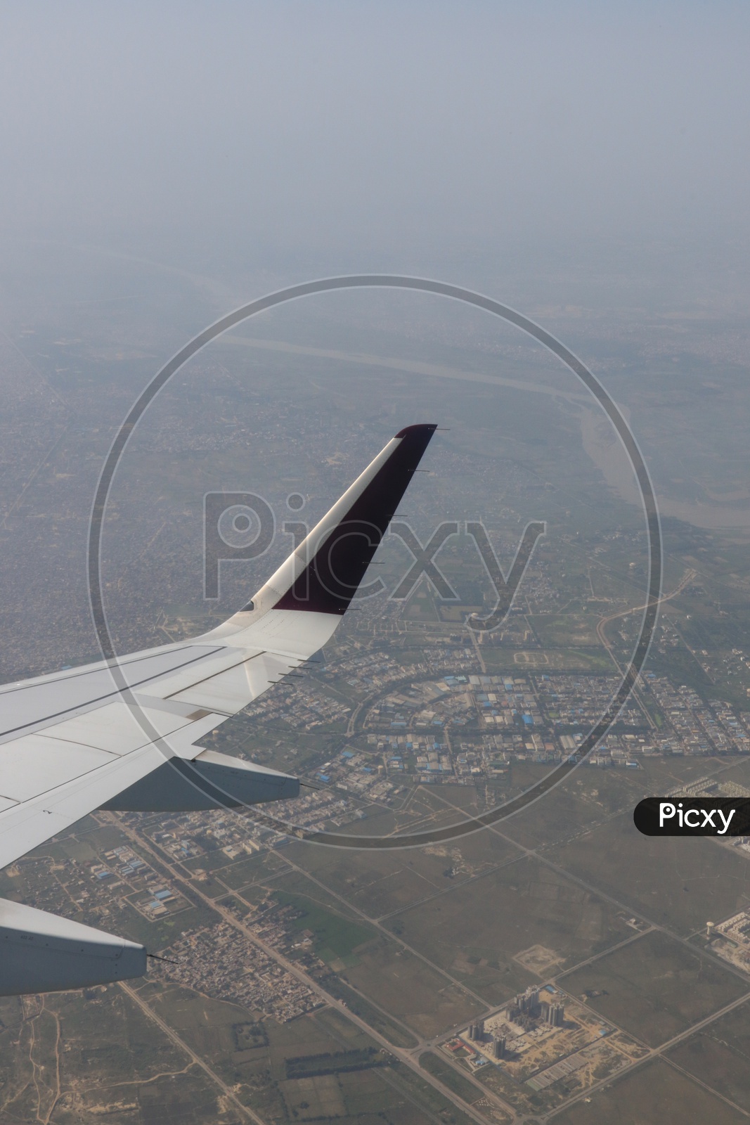Delhi city in aerial view captured from flight window