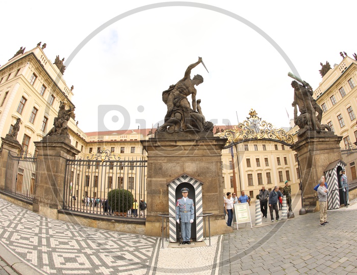 Tourists At a Fort Entrance Gate In Prague