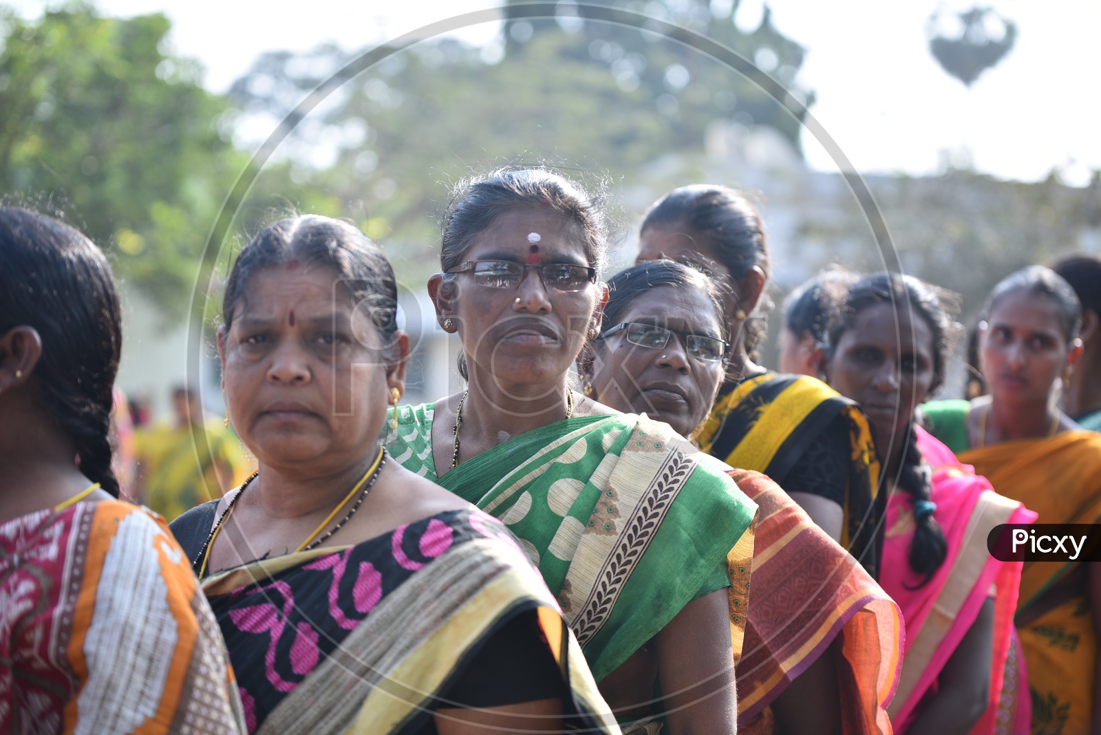 People standing in queue to vote in Telangana