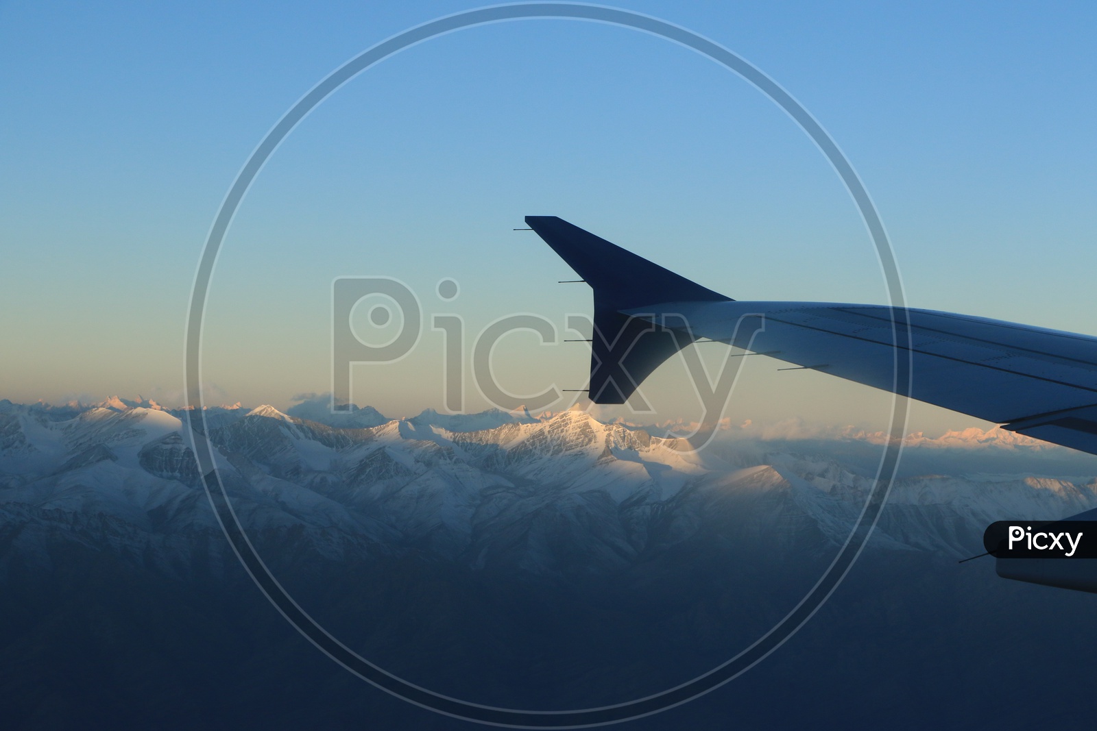 Beautiful Landscape of Snow Capped Mountains of Leh captured from flight window