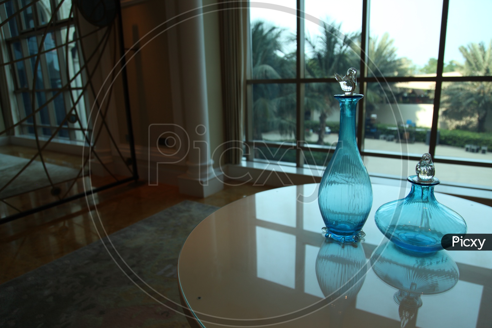 Blue Glass vases on a table