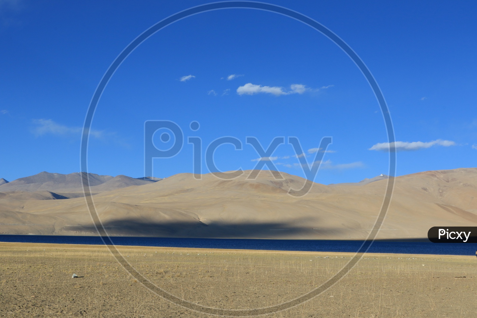 A River Valley With Sand Dunes and Blue Sky in Leh