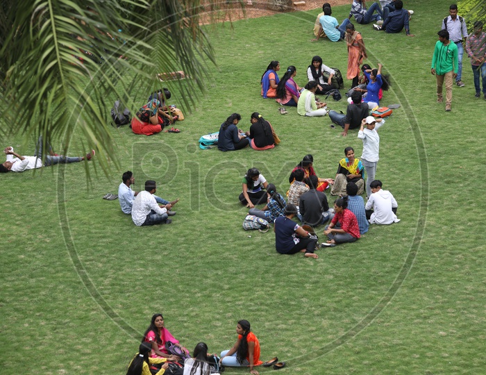 Indian College Students Sitting in a Lawn