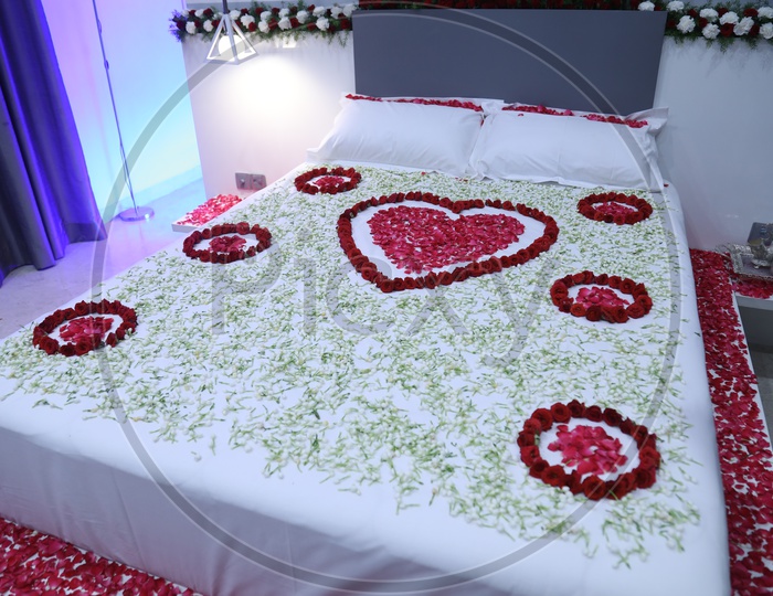 Indian Bed Decorated With Flowers For Newly married Couples